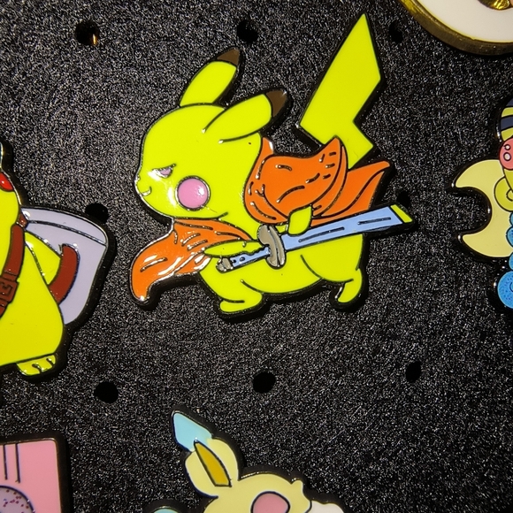 Pokemon Accessories - Pokemon Yellow Pikachu with Orange Cape and Silver Sword Pin
